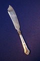 Rosenholm 
sølvtøj 
sølvbestik i 
3-tårnet sølv.
Lagkagekniv i 
pæn, brugt 
stand
L 27cm 
Lager: 1