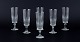 Et sæt på seks 
svenske 
champagnefløjter 
i klart glas. 
Facetslebet.
Ca. 1930’erne.
Perfekt ...