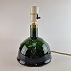 Mundblæst lampe 
af grønt glas 
med 5 
dekorative 
huller i.
Model Meteor, 
Type B
Design Michael 
...
