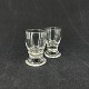 Pepitaglas 
lavet på dansk 
glasværk i 
1860'erne.
Højde 6,5 cm. 
Begge glas er 
med hul fod og 
...