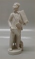 Kgl. figur fra 
Royal 
Copenhagen 4109 
Mand med klæde 
20 cm  I hel og 
fin stand- 
Design Bode ...