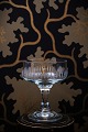 Gammel 
champagneskål 
med fint enkelt 
slebet mønster 
på siden af 
glasset. H: 
11cm. Dia.: 
9cm. (4 ...