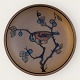 Bornholmsk 
keramik, 
Hjorth, Brun 
stentøj, Nr. 
34, Fugl på 
gren, 12cm i 
diameter *Pæn 
stand*