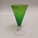 Stjerneborg 
vinglas. Grøn 
kumme med 
dekoration af 
stjerner. Knop 
og fod i klart 
glas. Design af 
...