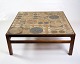 Sofabordet, 
lavet af 
palisander og 
keramik, er et 
unikt 
møbelstykke 
designet af Tue 
Poulsen og ...