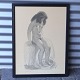 Indrammet tryk 
i sort ramme. 
Et trykt nøgen 
portræt fra 
1943 af 
siddende ung 
kvinde i sort 
og ...