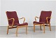 Bruno Mathsson 
(1907-1988)
Et par Mina 
lænestole
Stel 
fremstillet af 
lakeret 
formspændt ...