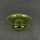 Diameter 12 cm.
Højde 4,5 cm.
Fin grøn 
presseglas skål 
fra 1905.
Den er med 
gylden ...