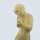 Kai Nielsen 
figur "Eva med 
æblet" i 
uglaseret 
lertøj for 
Kähler.
H. 30,5 cm.
Signeret "HAK" 
i ...