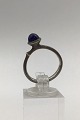 Ole Lynggaard 
Sterling Sølv 
Lotus Ring 
(Lapis Lazuli) 
Måler Ring Str. 
52 (US 6) Vægt 
3 gr (0.10 oz)