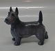 Kgl. figur fra 
Royal 
Copenhagen 3161 
Skotte hund 
standing Th. 
Madsen 10 cm I 
hel og fin 
stand
