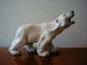 Dahl Jensen af 
en brølende 
isbjørn. 
Dek. nr. 1310 
længde 23 cm
højde 15 cm. 
1. ...