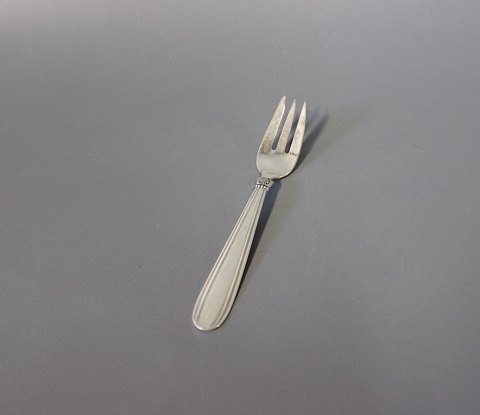 Cake fork in "Karina", hallmarked silver.
5000m2 showroom.