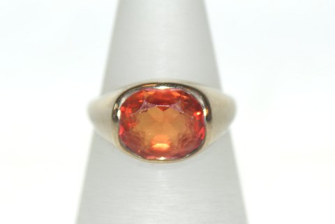 Large gold ring with Orange stones