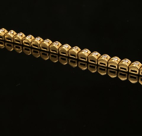 Tennis wrist band, 18ct gold with 57 diamonds