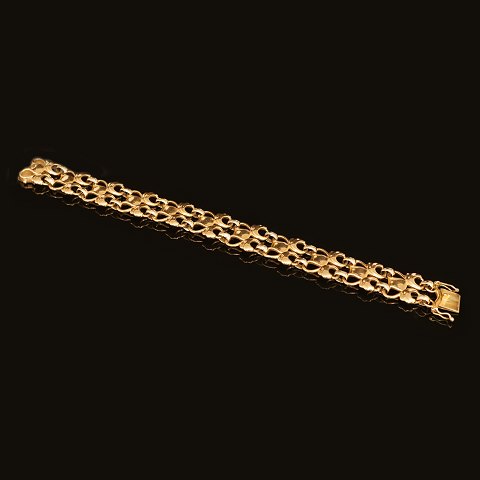 A Georg Jensen Art Nouveau bracelet in 18kt gold. 
Denmark 1933-44. L: 18cm. W: 26,3gr