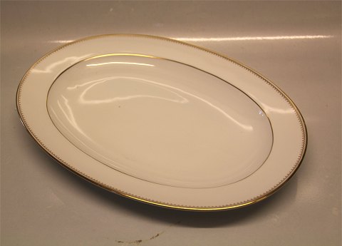 016 Ovalt fad 33,5 cm B&G Menuet: Hvidt porcelæn, takket guldkant, hvid, form 
601 Bing & Grøndahl 
