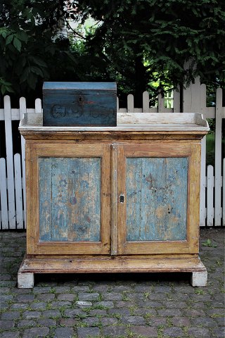 Swedish 19th century cabinet with gallery edge and scraped original color.