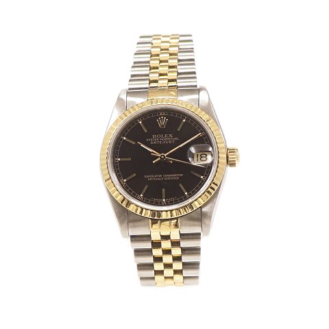 Rolex Oyster Perpetual Datejust. Guld/stål. Sort 
skive. Ref. 68273. Årgang 1991. Med box, 
certifikat og original købskvittering. D: 31mm