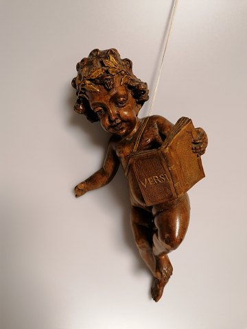 Little angel of carved wood