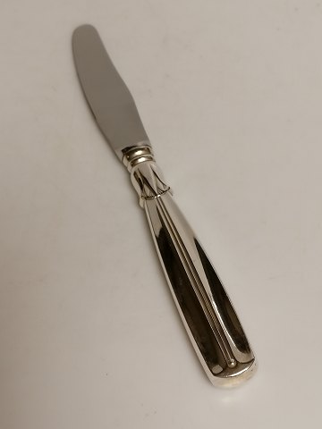 Lotus silver cutlery wooden tower and 830s dinner 
knife length 22cm