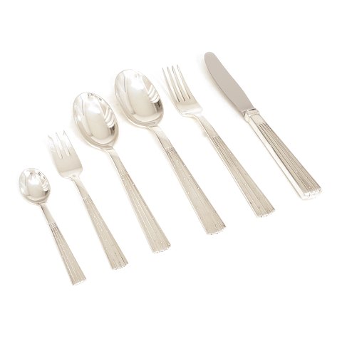 Jens Harald Quistgaard, Denmark: Champagne silver 
cutlery for 12 persons. (73)