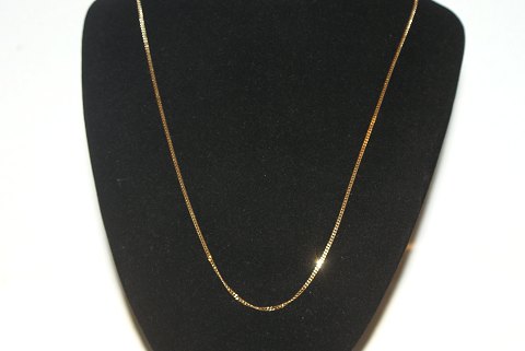 Armored faceted necklace in 14 carat gold