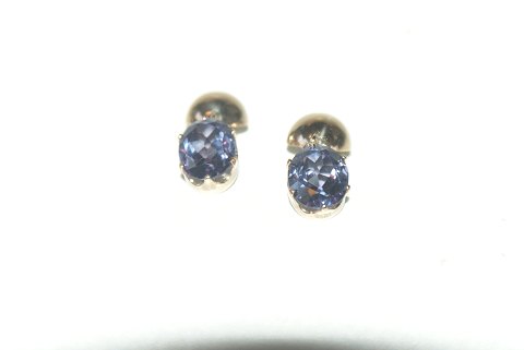 Earrings with blue stone clips and 14 carat gold