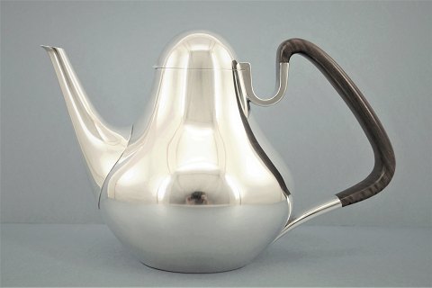 Georg Jensen, Henning Koppel; A pitcher of sterling silver and ebony #1017