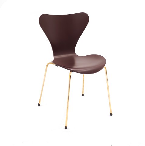 Arne Jacobsen: A 60 years anniversary chair, gold 
plated. Made by Fritz Hansen