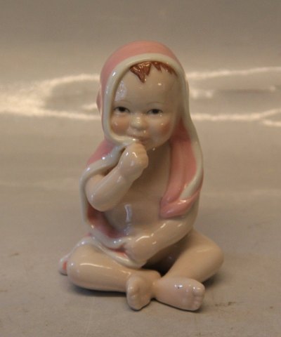 0021 RC Sitting Baby Girl in pink 11 cm (1249021)  Allan Therkelsen Royal 
Copenhagen 
