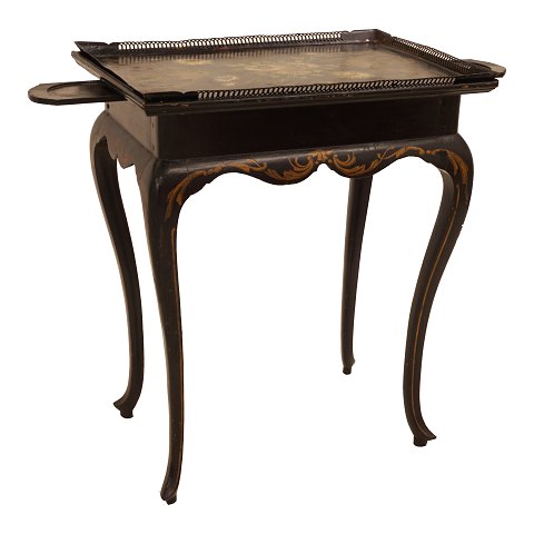 A blackpainted metal tray top table. Denmark late 
18th centruy. H: 75cm. Tray: 44x63cm