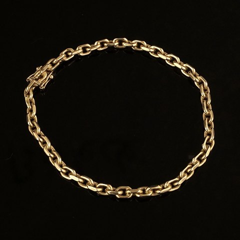 Anker armbånd i 14kt guld. Ledstørrelse: 6x4mm. L: 
19,5cm. V: 12gr