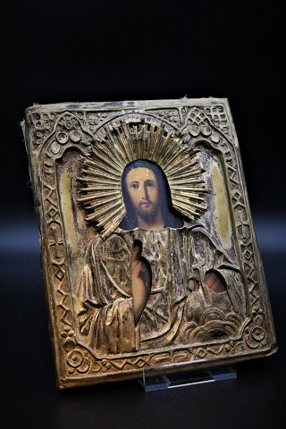 Old Greek Icon painted on wood with mounted Riza of brass with a really nice 
patina. 22x18cm.