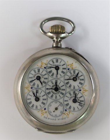 Silver pocket watch (800) with several time zones. Depose no. 4975. Copenhagen, 
New York, Stockholm, Petersburg, Paris and Christiania. Diameter 55 mm. The 
clock works