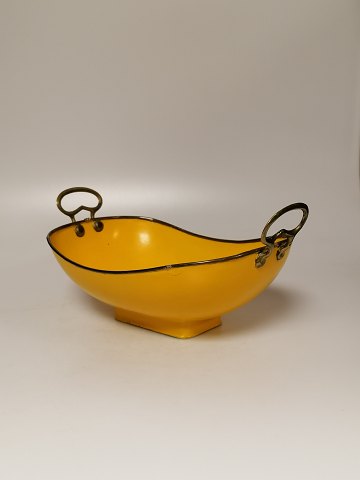 Bread tray of yellow-painted metal with brass edge 
and handles