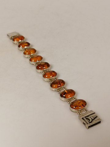 Bracelet of sterling silver and amber