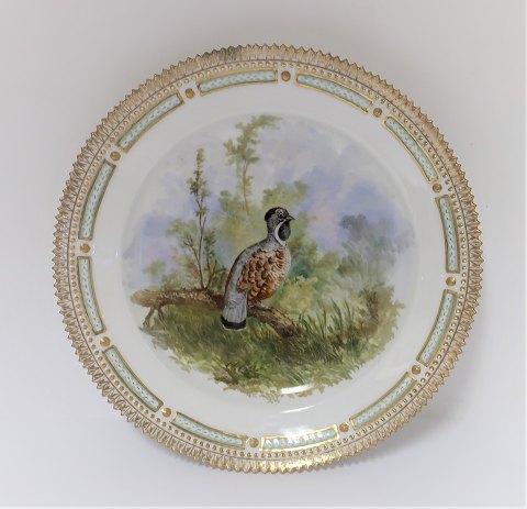 Royal Copenhagen. Fauna Danica. Lunch plate. Model # 239 - 3550. Diameter 22 cm. 
(1 quality). Tetrao bonasia. The plate is with repair. (see photo)