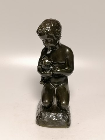 Just Andersen figure of disco metal sitting boy 
with teddy bear no. D2320