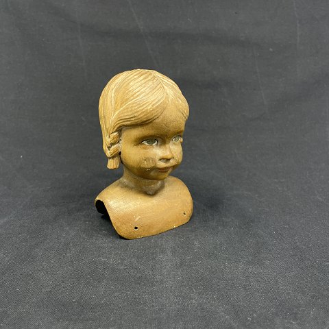 Hand-carved doll head from 1920
