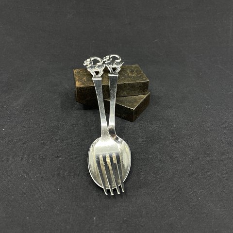 A set of children's cutlery in silver