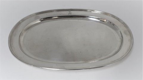 Sasikov. Russia. Saint Petersburg.
Oval silver tray with 4 feet (84). Crowned monogram. Length 24.5 cm. Width 16.5 
cm. Produced 1868.