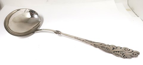 Tang. Large serving spoon. Length 33 cm. Produced 1918.