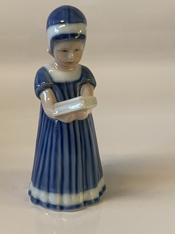Royal Copenhagen #Else with book with a small chip at the bottom
of the dress see picture