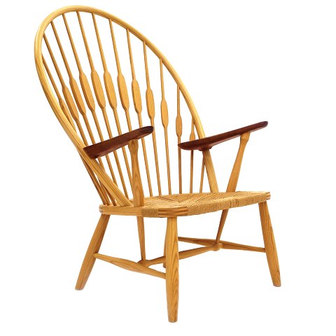 Hans J. Wegner Påfuglestol. Hans J. Wegner: JH 550 
Påfuglestol i ask med armlæn af teak og sæde i 
papirgarnsflet. Fremstillet af Johannes Hansen. 
Design fra 1947