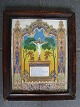 Indrammet 
katolsk devise.
Præget papir 
med bemaling og 
guld.
År ca. 1880.
Den 
korsfæstede ...