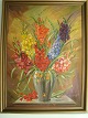 Knud J. 
Clemmensen 
(1870-1953):
Forskellig 
farvede 
gladiolus i 
vase på bord - 
1945.
Olie på ...