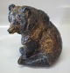 Royal 
Copenhagen 
Aluminia 
Faience 
figurine 3823 
Bear, sitting 
17,5 x 14. JG 
Signed Jeanne 
Grut ...