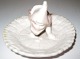 Porcelain Gnome 
on a dish. 
Funny little 
dish. Measures 
9,5cm. In okay 
condition, but 
the dish ...