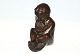 Bronze figure of boy with fish